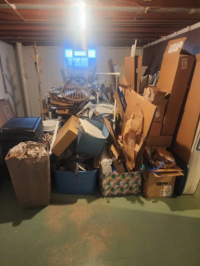 Roll-off dumpster container at job site for 15 Yard Dumpster Rental in Three Rivers